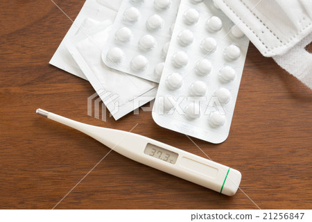 Thermometer and medicine 21256847