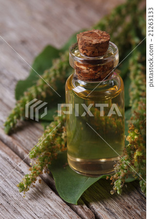 Plantain juice in a glass bottle macro vertical Plantain juice in a glass bottle macro vertical 21263133
