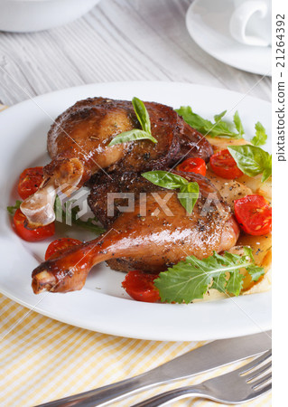 Delicious duck legs with apples closeup vertical 21264392