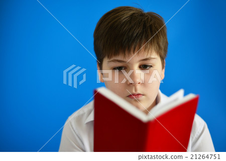 Boy teenager looking in day planner 21264751