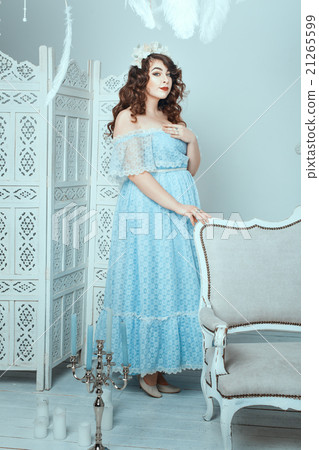 Women with overweight standing in the room. Women with overweight standing in the room. 21265599