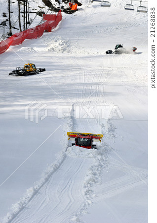 Three ratrak doing track maintenance Three ratrak doing track maintenance 21268838