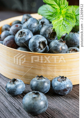 Blueberry on wooden board 21269412