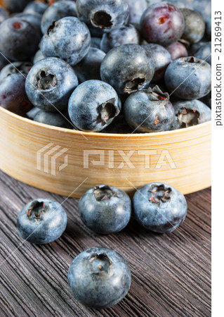 Blueberry on wooden board Blueberry on wooden board 21269413