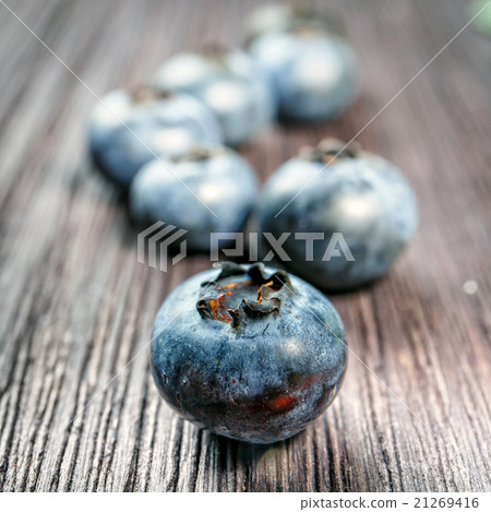 Blueberry on wooden board Blueberry on wooden board 21269416