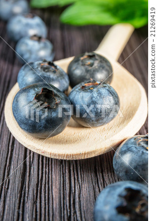 Blueberry on wooden board Blueberry on wooden board 21269419