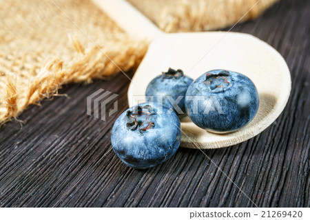 Blueberry on wooden board Blueberry on wooden board 21269420