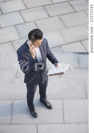 Above view of an Asian Business man. Above view of an Asian Business man. 21272143
