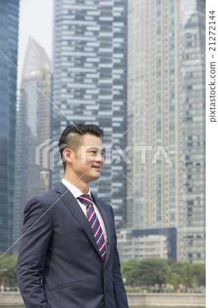 Asian businessman looking away. Asian businessman looking away. 21272144