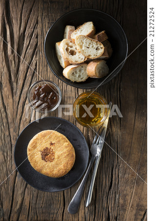 Traditional British meat pie on a rustic table. Traditional British meat pie on a rustic table. 21272524