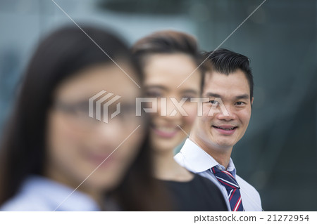 Three Asian business men and women. 21272954