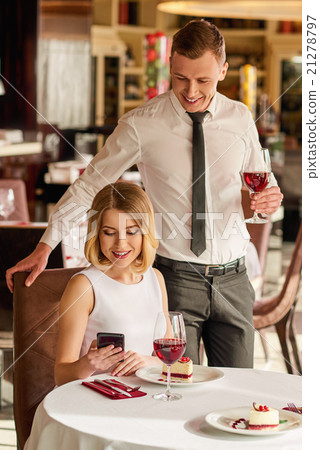 Lovely couple at the restaurant. 21278797