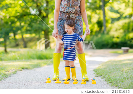 Mother and little child playing together Mother and little child playing together 21281625