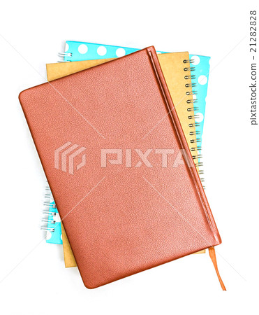 Notebook stack on white background. 21282828