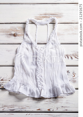 Lace tank top on shelf.  21291675