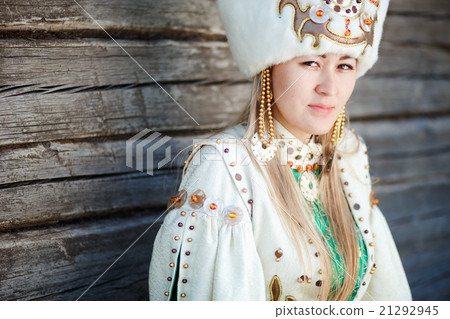 Portrait of a young woman in traditional dress. 21292945