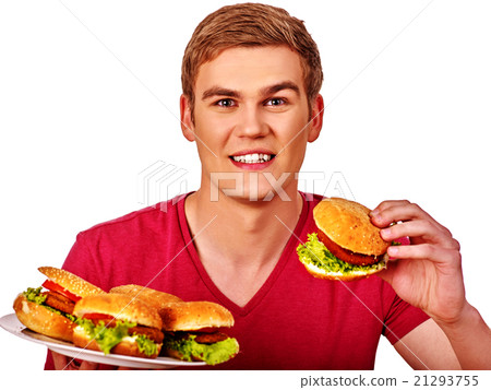 Man eating big hamburgers. 21293755