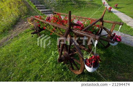cart of flower pots with red flowers cart of flower pots with red flowers 21294474