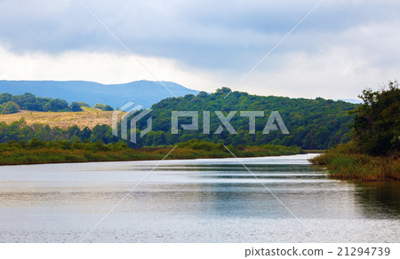 River with mountains and forests 21294739