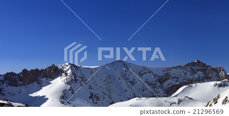 Panoramic view on snowy mountains in morning Panoramic view on snowy mountains in morning 21296569