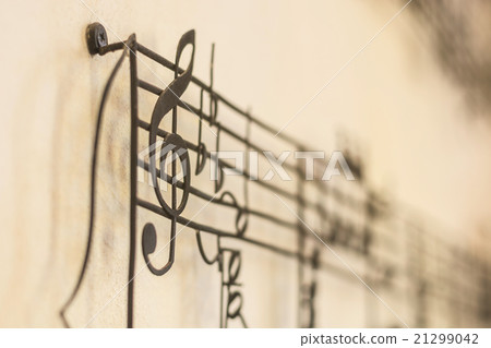 "G Clef" old steel on the old wall  21299042