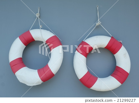 Two Life Buoy Hanging on A Wall 21299227