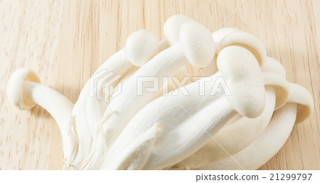 Raw Shimeji Mushroom on Wooden Cutting Board 21299797