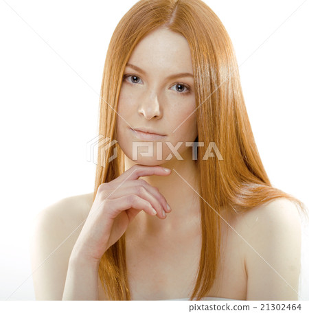 beauty young redhead woman with red flying hair 21302464