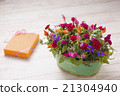 Arrangement of carnation and potatoes 21304940