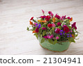 Arrangement of carnation and potatoes 21304941