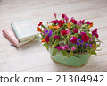 Arrangement of carnation and potatoes 21304942