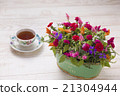 Arrangement of carnation and potatoes 21304944