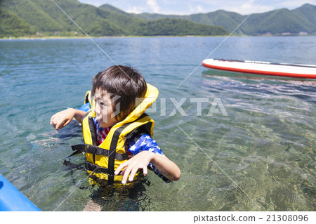 Boys playing marine sports 21308096