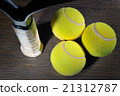 tennis racket and ball 21312787