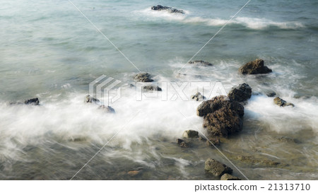 The movement of the waves through the rocks 21313710