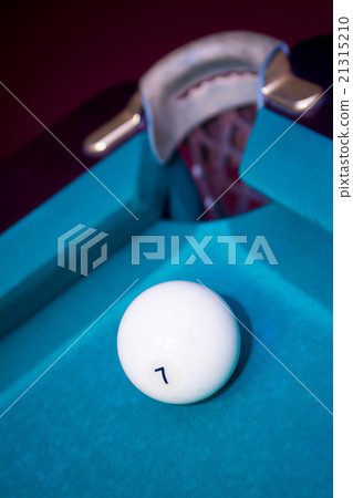 Closeup shot of white ball going in pocket 21315210