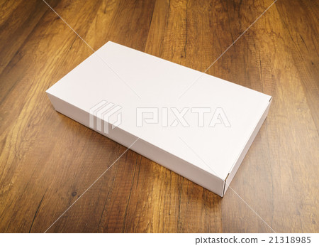 Blank white box mock up on wood background 21318985