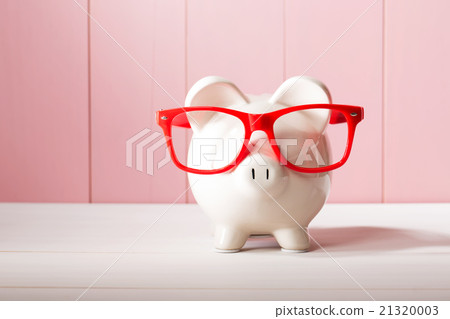 Piggy bank with red glasses Piggy bank with red glasses 21320003