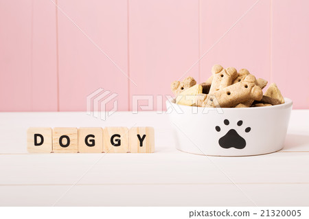 Dog treats on a white bowl Dog treats on a white bowl 21320005