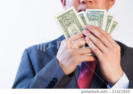 Greedy Business man showing off his money Greedy Business man showing off his money 21321920