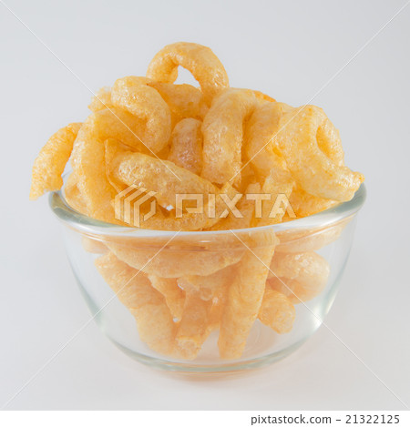 Pork cracklings in a glass bowl 21322125