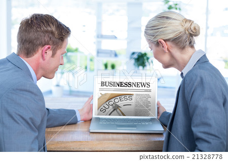 Composite image of business people looking at blank screen of la Composite image of business people looking at blank screen of la 21328778
