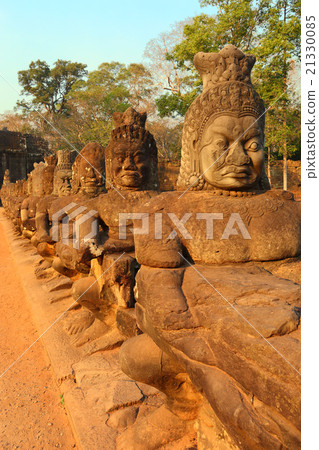 Stone carved statues of Devas in Cambodia Stone carved statues of Devas in Cambodia 21330085