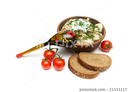 Russian dumplings, cherry tomatoes and bread. Russian dumplings, cherry tomatoes and bread. 21333117