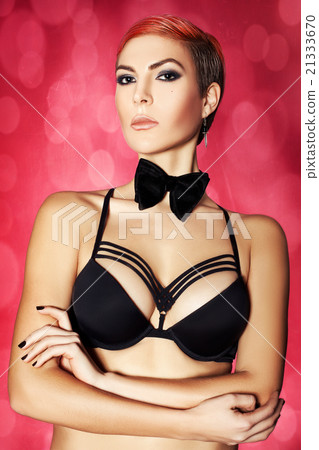 Portrait of a girl with folded hands Portrait of a girl with folded hands 21333670