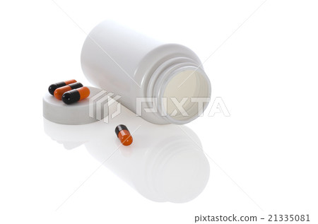 few pills with white jar and bottle 21335081