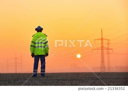 Worker at the sunrise Worker at the sunrise 21336352