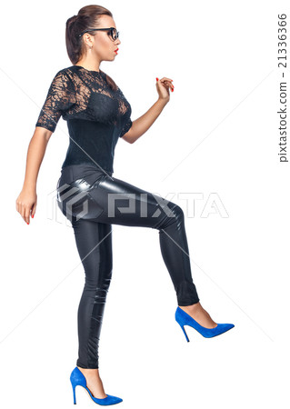 Girl sideways on a white background. 21336366