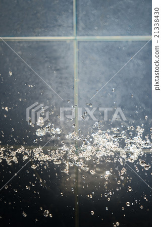 Drops of water levitate in bathroom 21338430