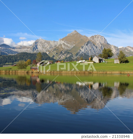 Alpstein range mirroring in lake Schwendisee 21338946